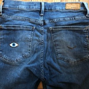 Mid Rise Winky Face Express Jeans